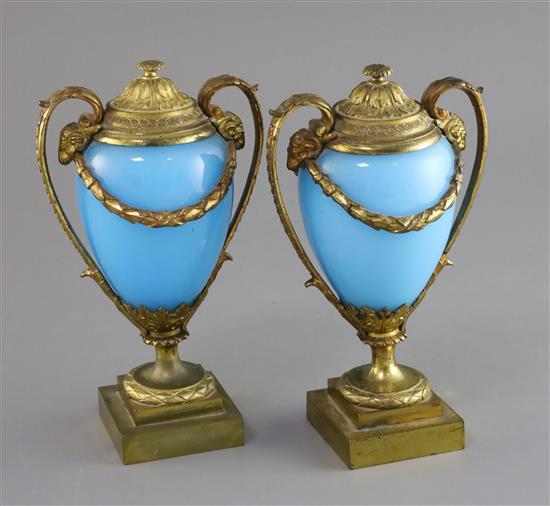 A pair of 19th century French ormolu and opaque blue glass cassolets, height 8.5in.